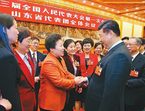 习近平 李克强 王沪宁 赵乐际 韩正 分别参加全国人大会议一些代表团审议在“三八”国际劳动妇女节到来之际，习近平代表党中央，向妇女代表、委员及全国各族各界妇女同胞，致以节日的祝贺和诚挚的祝福
