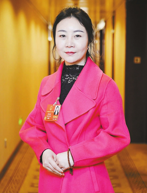始终做农民工的代言人——记全国人大代表、山河智能营销总公司营销经理张晓庆